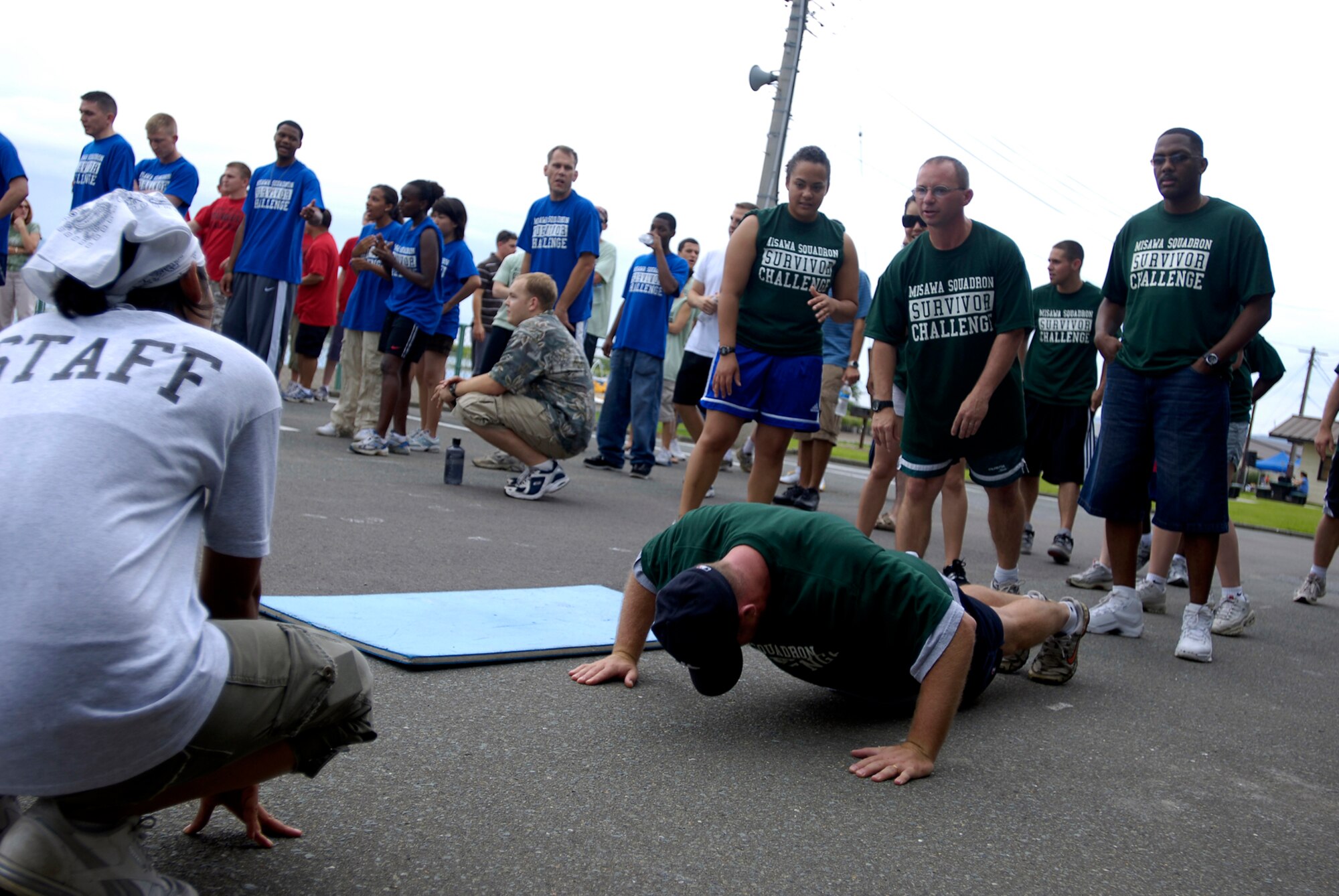 MISAWA AIR BASE, Japan -- Airmen compete in a squadron survivor challenge during the Labor Day Beach Bash Aug. 29, 2008.  Beach bashes are held for base morale and attract crowds with music and free food.  (U.S. Air Force photo by Senior Airman Chad Strohmeyer)