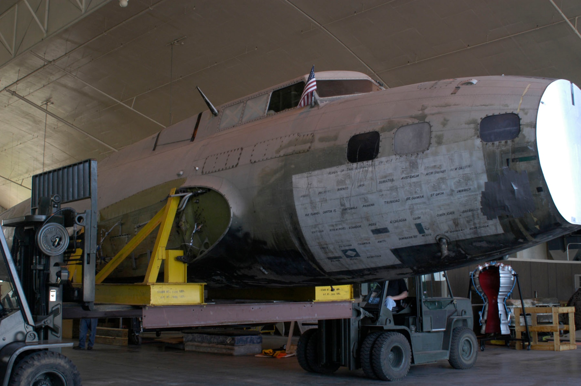 DAYTON, Ohio -- Restoration crews work together to unload the fuselage of the B-17D "The Swoose" that recently arrived at the National Museum of the U.S. Air Force from the National Air and Space Museum. (U.S. Air Force photo)