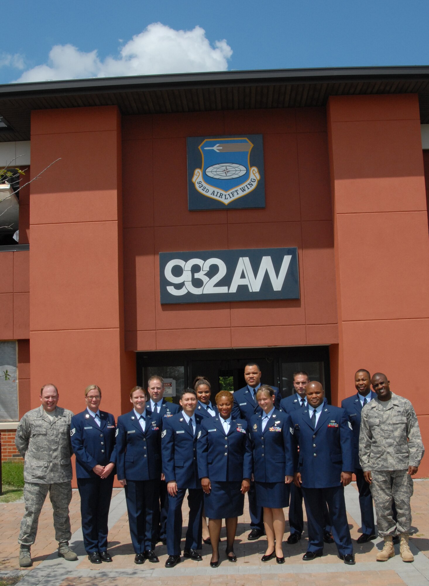 Graduates and teachers of the Air Force Reserve Command's Noncommissioned Officer Development Course for August, stand outside the headquarters at the 932nd Airlift Wing.  U.S. Air Force photo by Maj. Stan Paregien