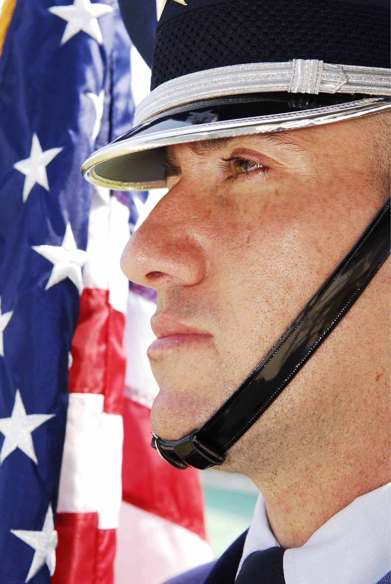 Staff Sgt. Kelly McKinely, a ceremonial guardsman, carries the American Flag Aug. 29 during a Base Honor Guard practice. Since January, Osan’s honor guard has preformed more than 108 details at a variety of ceremonies including military funerals, retreat ceremonies and retirements. Sergeant McKinely is a member of the 51st Maintenance Group. (U.S. Air Force photo/Senior Airman Christopher Boitz)