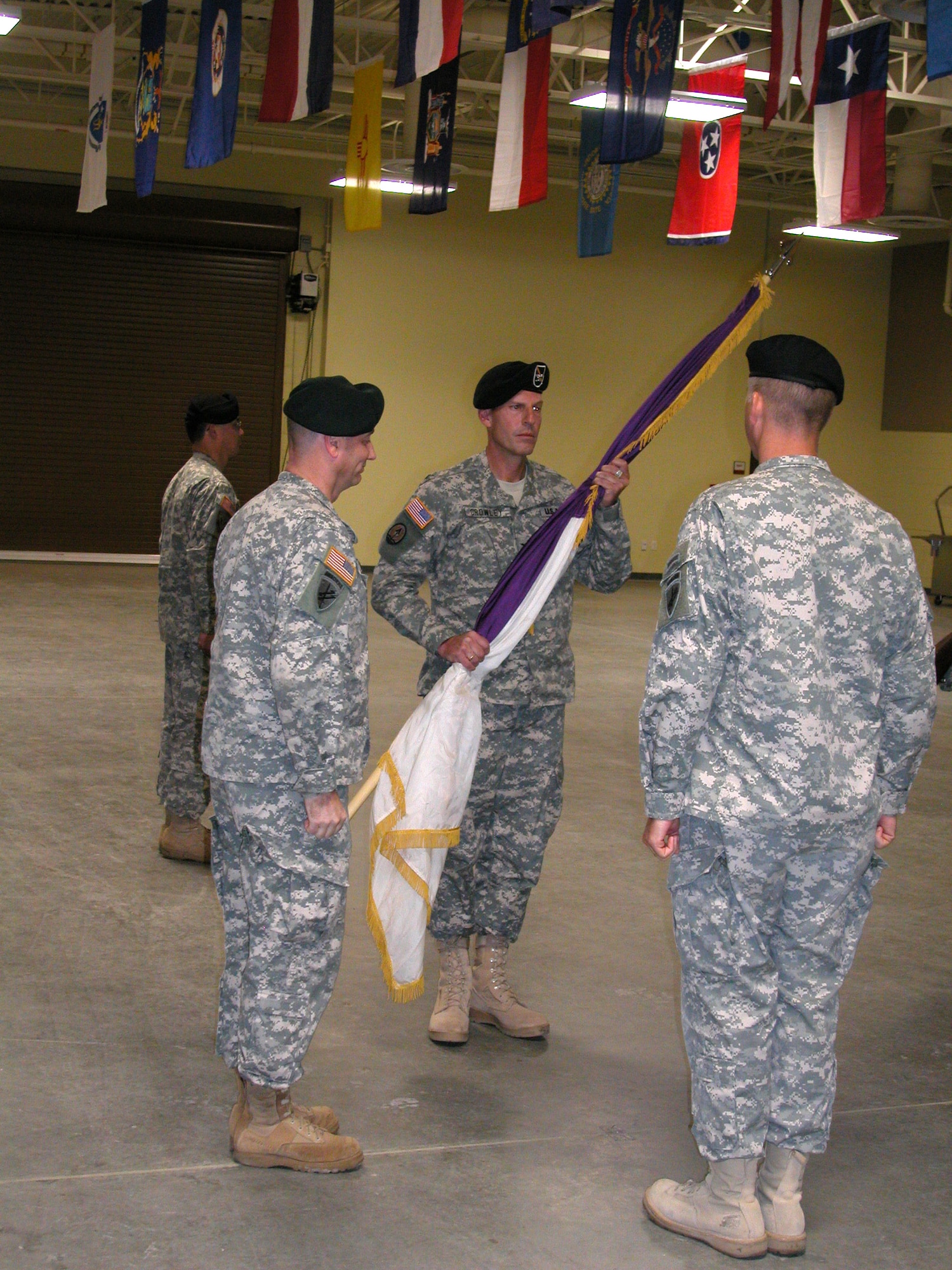 Colonel Robert E. Crowley (facing) assumes command of the 358th Civil Affairs Brigade from Col. Stuart “Toby” Pennels during a change of command ceremony on Aug. 9 at March Air Reserve Base presided over by Col. Sean M. Kelly, deputy commander and chief of staff, 351st Civil Affairs Command. Civil Affairs is the capability the U.S. Army employs to enhance cooperation between the military and the civilian population of a foreign country. Its forces provide cultural expertise and the unique ability to work together with the civilian population of a war zone or disaster relief area. The 358th Civil Affairs Brigade is part of the U.S. Army Civil Affairs and Psychological Operations Command which is headquartered at Fort Bragg, N.C. They are one of the major contributors in the rebuilding efforts in Iraq and Afghanistan, providing humanitarian aid and restoring basic service. The Brigade recently moved from Norristown, PA, to March ARB. (U.S. Air Force photos by Maj. Don Traud, 452 AMW/PA)