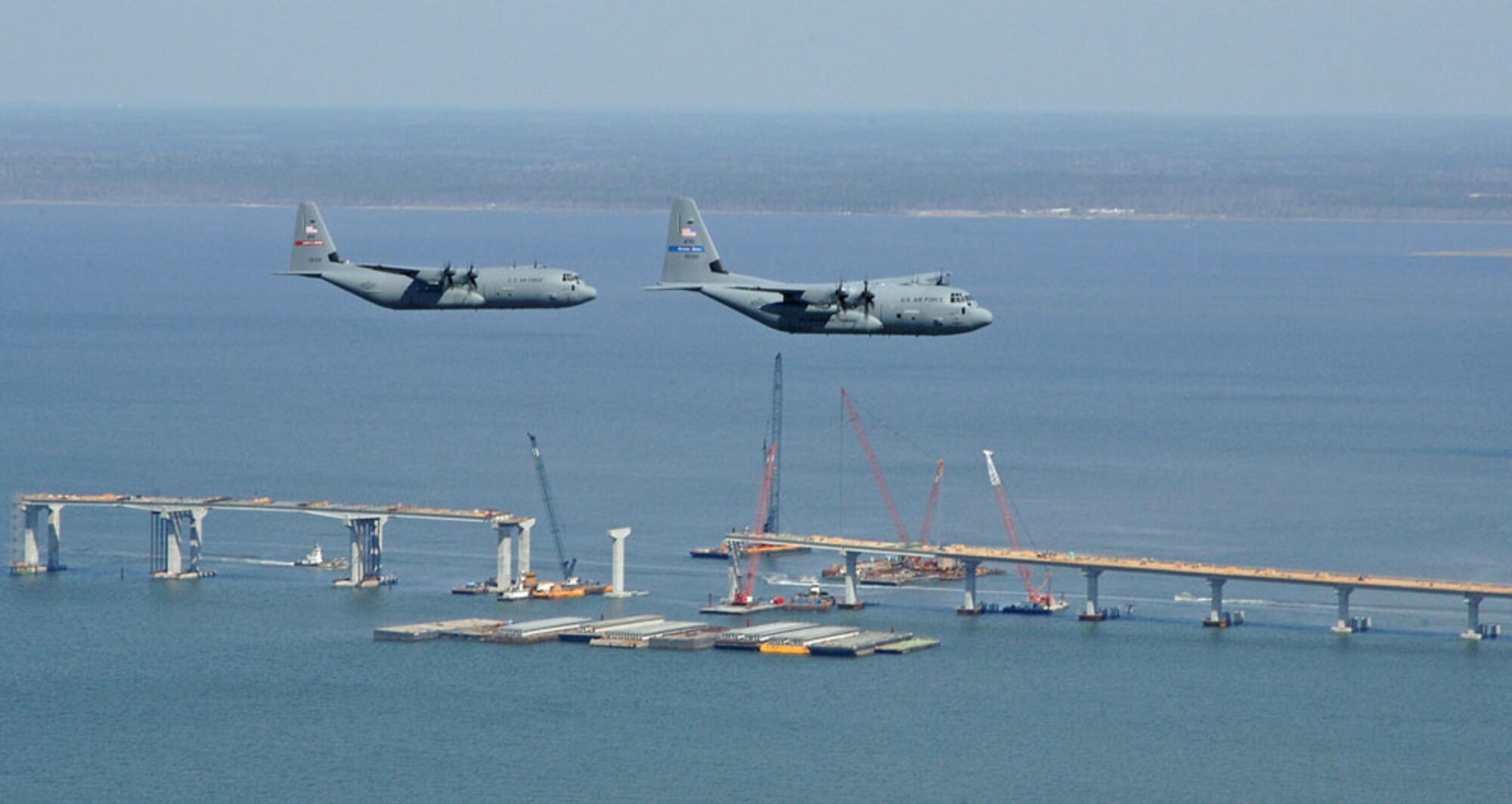 "Hurricane Hunters" such as these aircraft, the WC-130J (right) and C-130J-30, are part of the Air Force Reserve's 403rd Wing located at Keesler Air Force Base, Miss. (U.S. Air Force Photo/Tech. Sgt. James B. Pritchett)