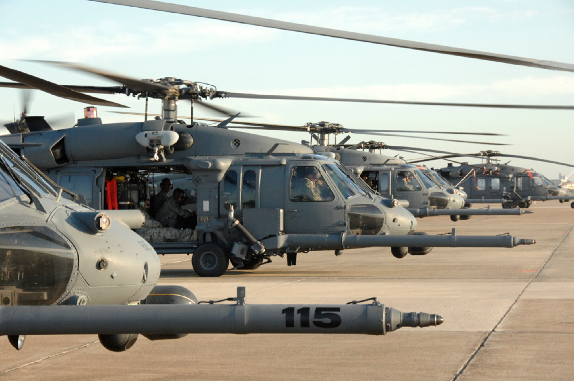 A line of HH-60G Pave Hawks from the 943rd Rescue Group, Davis-Monthan Air Force Base, Ariz., 176th Wing, Kulis Air National Guard Base, Alaska, and 129th Rescue Wing, Moffett Federal Airfield, Calif., sit on the flightline at Ellington Field, Texas, Sept. 3. The U.S. Air Force and Air National Guard aircraft and personnel provided the governors of Louisiana and Texas air search and rescue assets for the response to Hurricane Gustav. (U.S. Air Force photo by Technical Sgt. Ray Aquino)