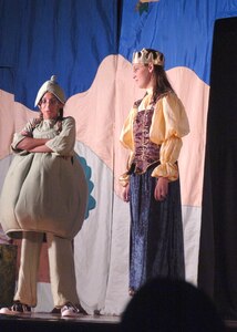 Aspiring actresses, Sarah Sunday, 13, the Pea, and Claire Grissom, 13, the Princess, have a heart to heart talk aout their friendship during a free performance at the Reel Time Theater here Aug. 23.  The play was sponsored by the Missoula Children’s Theatre. The play gives the military community a chance for all the kids to be together, make new friends and participate in an organized group activity. It also allows them see what goes into putting on a performance and introduces aspiring actors and actresses to the stage. (U.S. Air Force photo by Bobby Jones)