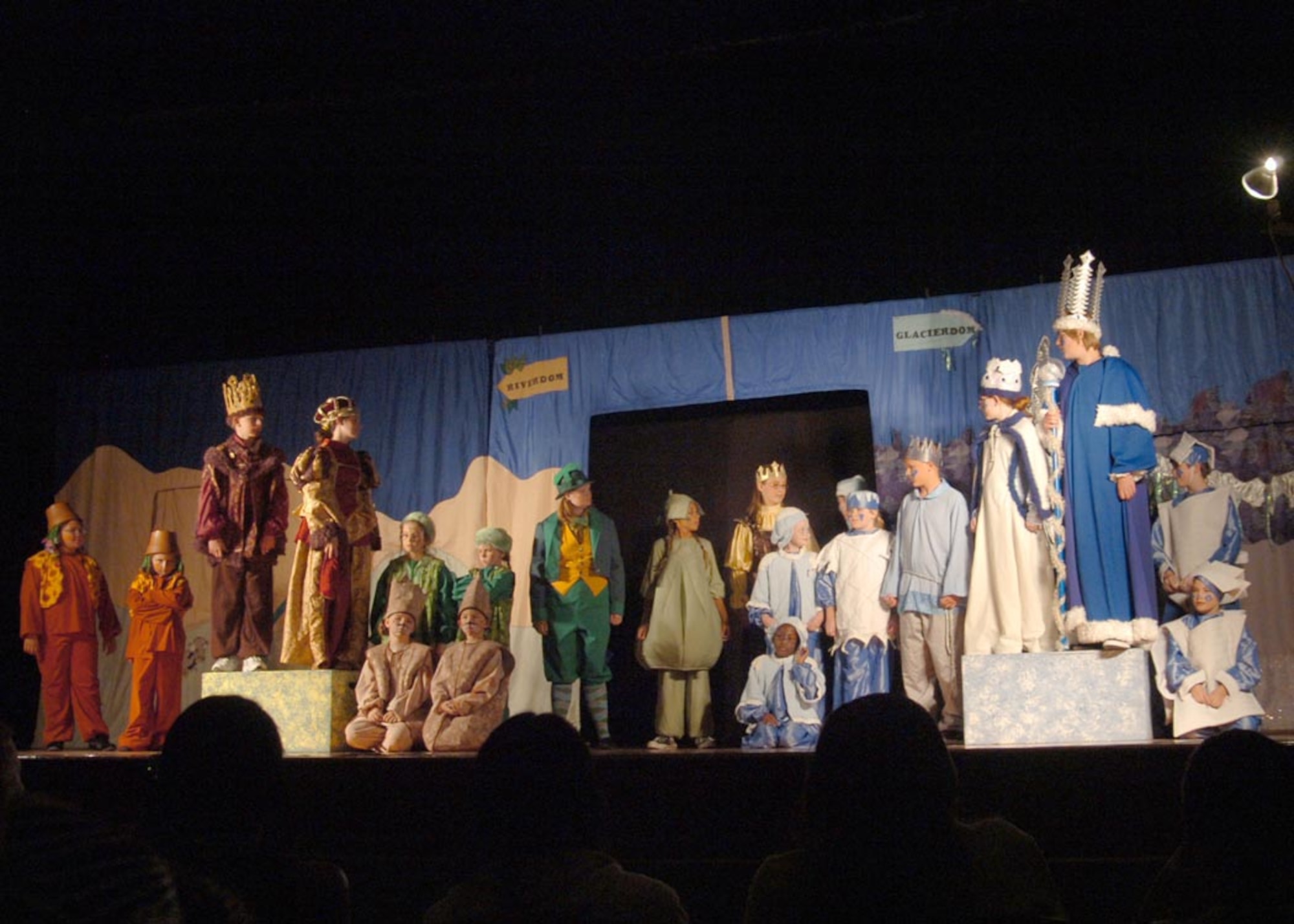The entire cast of “Princess and the Pea,” composed of children from Andrews give a free performance at the Reel Time Theater here Aug. 23.  The play was sponsored by the Missoula Children’s Theatre. The play gives the military community a chance for all the kids to be together, make new friends and participate in an organized group activity. It also allows them see what goes into putting on a performance and introduces aspiring actors and actresses to the stage. (U.S. Air Force photo by Bobby Jones)