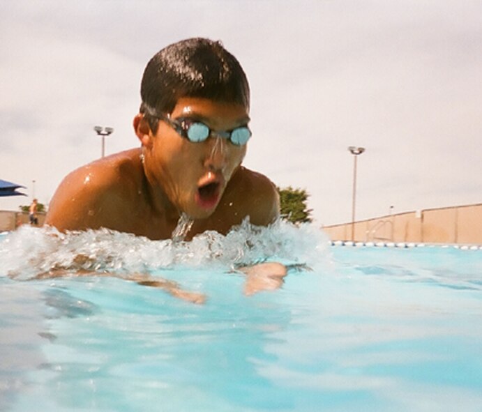 Earl Lara, 16, swims the breaststroke at the base pool Aug. 25. He, along with Abbey Allen and Derek Lair, competed in the Western Zone Swim Championship in Gresham, Ore., Aug. 5-9, where they were part of "Team Montana." The team was comprised of 42 swimmers from across the state and finished sixth out of 16 teams from across the West Coast. Their parents work for the 341st Missile Wing and they are juniors in high school. (U.S. Air Force photo/Senior Airman Eydie Sakura)