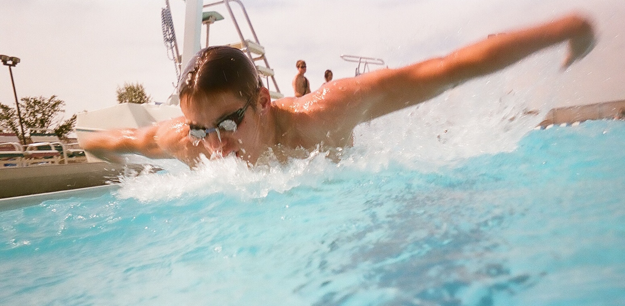 Derek Lair, 17, swims the butterfly stroke at the base pool Aug. 25. He, along with Abbey Allen and Earl Lara, competed in the Western Zone Swim Championship in Gresham, Ore., Aug. 5-9, where they were part of "Team Montana." The team is comprised of 42 swimmers from across the state and they finished sixth out of 16 teams from across the West Coast. Their parents work for the 341st Missile Wing and they are juniors in high school. (U.S. Air Force photo/Senior Airman Eydie Sakura)