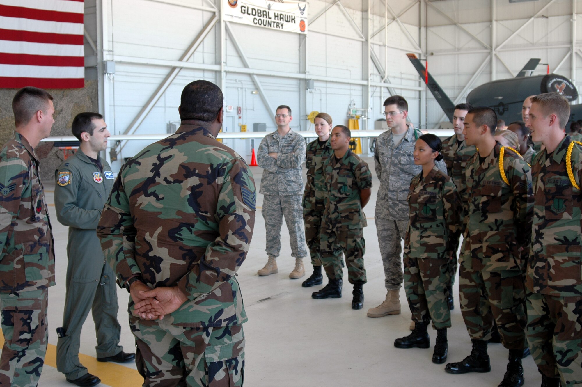 Airmen from the 311th and 314th Training Squadrons at the Presidio of Monterey, Calif., visit pilots and intelligence personnel at Beale Air Force Base, Calif., Aug. 22. Beale is home to both the U-2 Dragon Lady and the RQ-4 Global Hawk Unmanned Aerial Vehicle, both of which are intelligence-gathering aircraft. (U.S. Air Force photo)