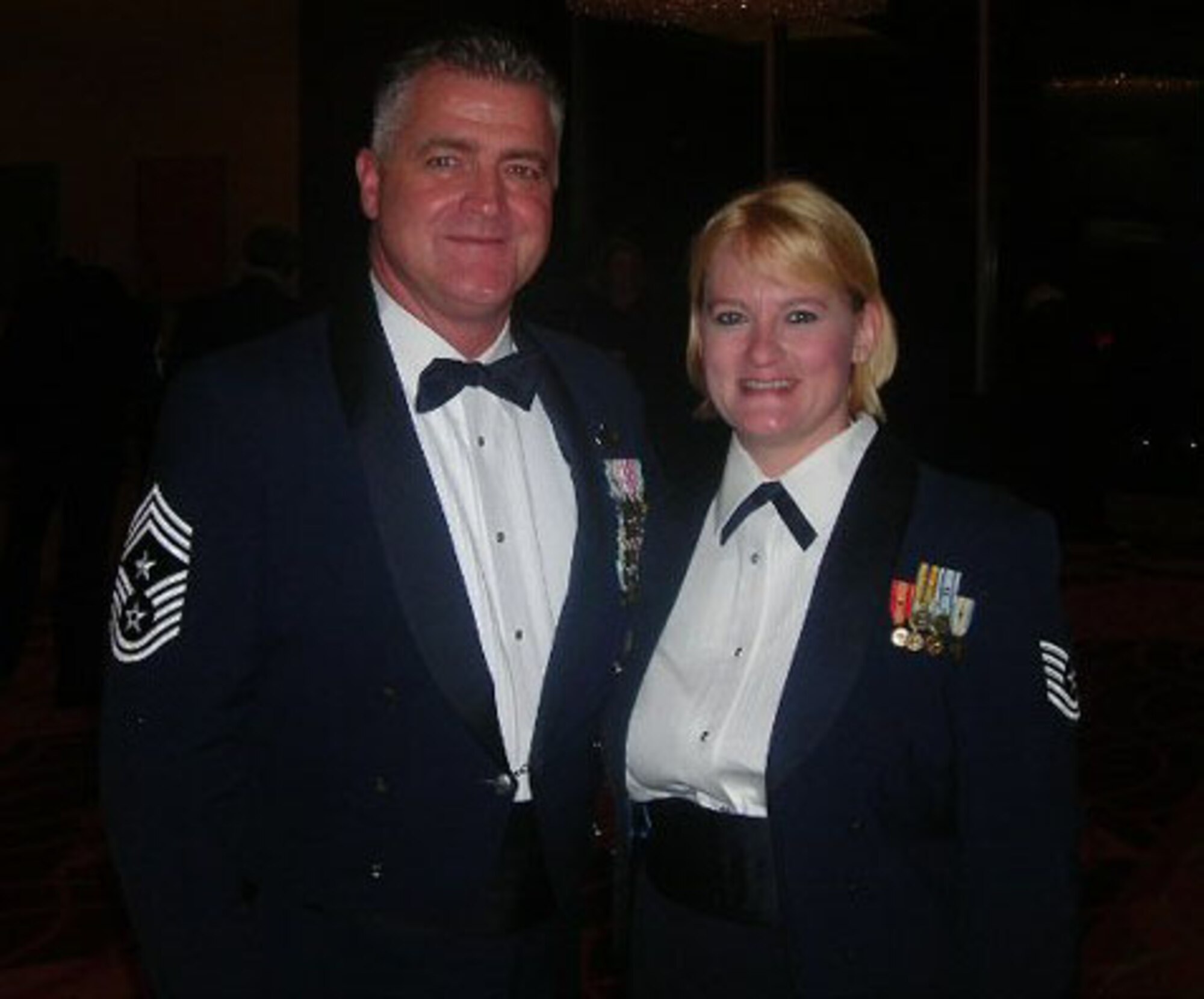 SEYMOUR JOHNSON AIR FORCE BASE, N.C. --  Tech. Sgt. Kim Browne, a Reservist with the 916th Mission Support Flight, takes a moment to pose with Chief Master Sgt. Troy McIntosh, command chief of the Air Force Reserve, while at a conference in San Antonio, Texas. Sgt. Browne was a representative for the 916th Air Refueling Wing at the Professional Airman's Conference in late August. The conference is the flagship event for the Air Force Sergeants Association.