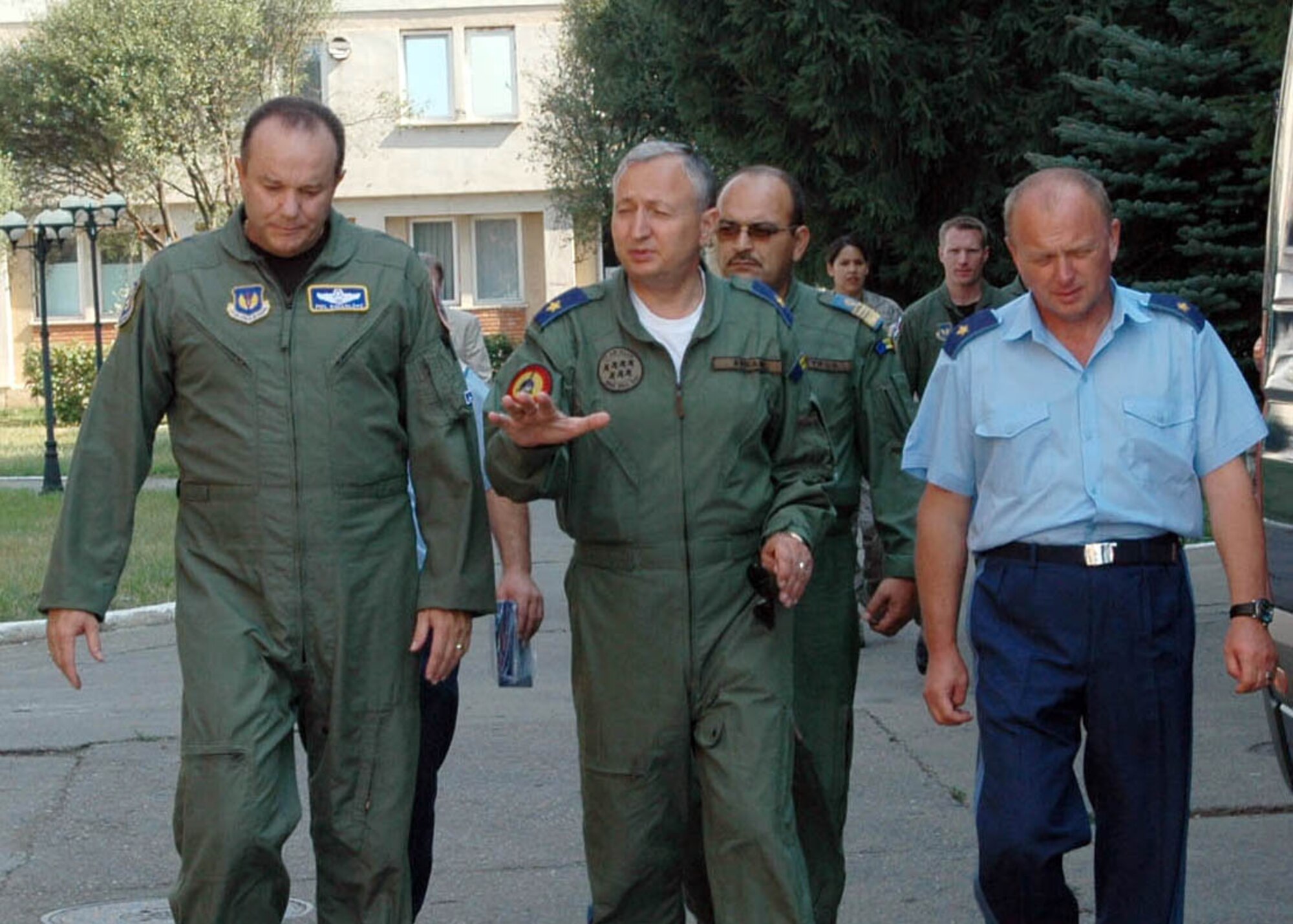 Lt. Gen. Philip Breedlove, 3rd Air Force commander, is escorted by Romanian Air Force Air Flotilla Gen. Ion Avram (center), commander of the 71st Air Base at Campia Turzii, Romania, during a tour of facilities being used by Airmen from the 510th Fighter Squadron, Aviano Air Base, Italy, for the Viper Lance ’08 Weapons Training Deployment.  The two were accompanied by Romanian Air Force Air Flotilla Gen. Vigil Ristea (right), the service’s chief of training and doctrine.  Lt. Gen. Breedlove visited the Romanian air base to recognize the teamwork between the USAFE Airmen and their Romanian AF counterparts during the two-week exercise that allowed both services to learn from the other and to strengthen the NATO alliance between them. (U.S. Air Force Photo by Technical Sgt. Charlein C. Sheets)