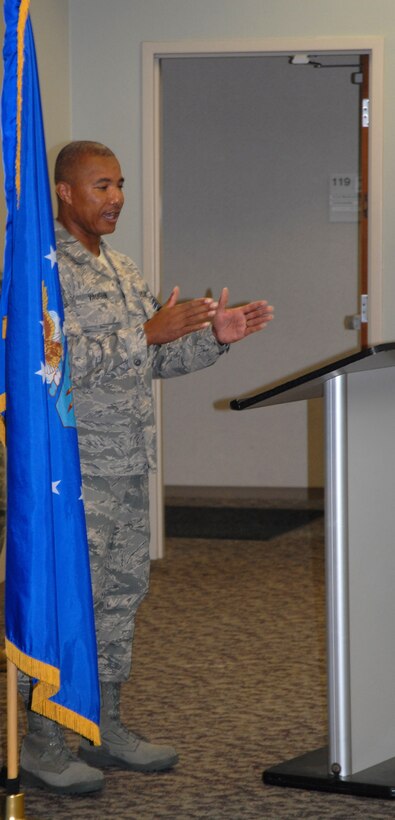 Chief Master Sgt. George Vaughn makes a statement of appreciation to the 932nd Airlift Wing during his first week as a new chief at Scott Air Force Base.  (U.S. Air Force photo by Maj. Stan Paregien)