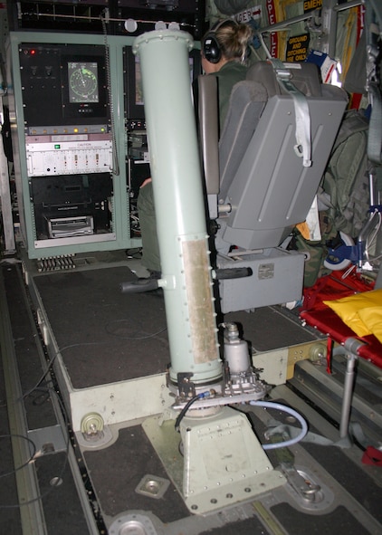 This tube, adjacent to the loadmaster position, is used to launch dropsondes into the storm as the aircraft flies through it.
Air Force photo by Senior Master Sgt. Raymond Sarracino
