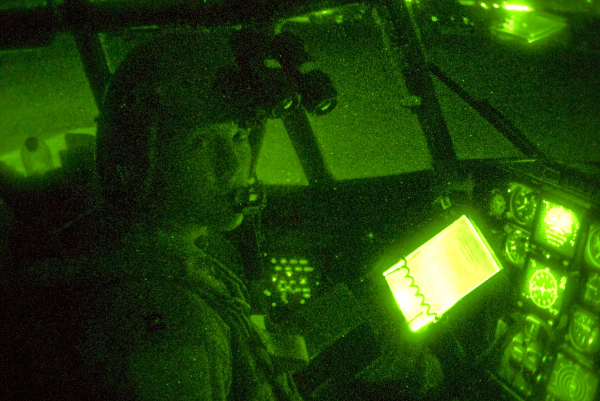 OVER IRAQ -- Capt. Sara Kershaw, a C-130 Hercules aircraft commander with the 777th Expeditionary Airlift Squadron flies an airlift mission between Al-Asad Air Base and Baghdad International Airport Sept. 3. Kershaw and her aircrew flew the 777th EAS' 25,000th combat sortie since beginning operations at Joint Base Balad in February 2006. In that time, the squadron has carried more than 200,000 passengers and more than 98 million pounds of cargo. The aircrew is deployed from Little Rock Air Force Base, Ark., and the aircraft is deployed from the Wyoming Air National Guard's 153rd Airlift Wing. (U.S. Air Force photo/Tech. Sgt. Erik Gudmundson)