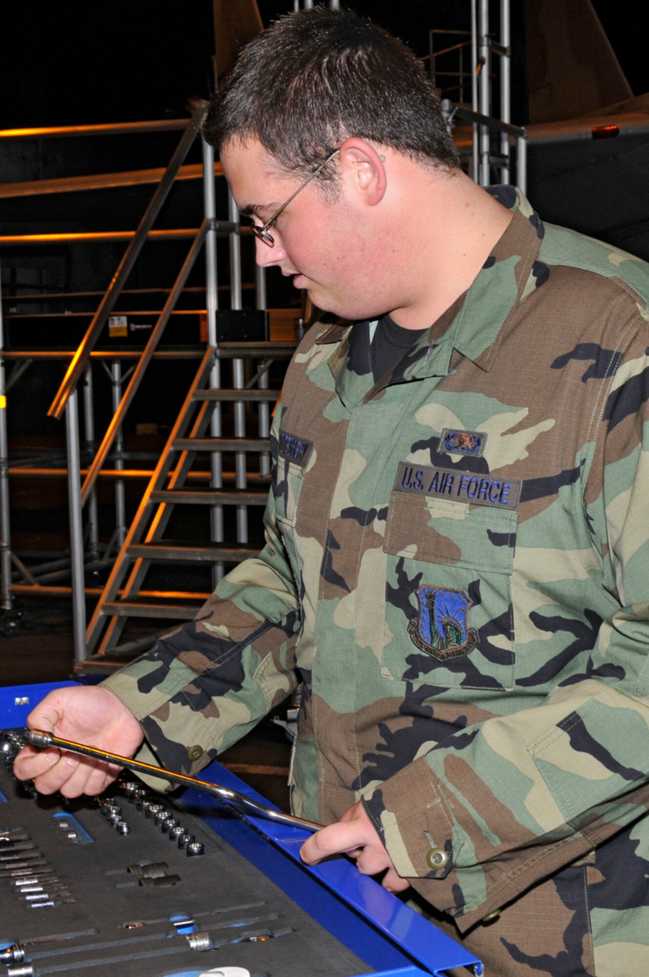 Senior Airman Nathan Stotesbery, 48th Equipment Maintanence Squadron F-15 phase inspection crew chief, performs in-depth inspections on an F-15 Eagle Aug. 29 at RAF Lakenheath, England. After 200 flying hours F-15 Eagles must be inspected to ensure the fighter is still mission ready. (U.S. Air Force photo by Airman 1st Class Perry Aston)