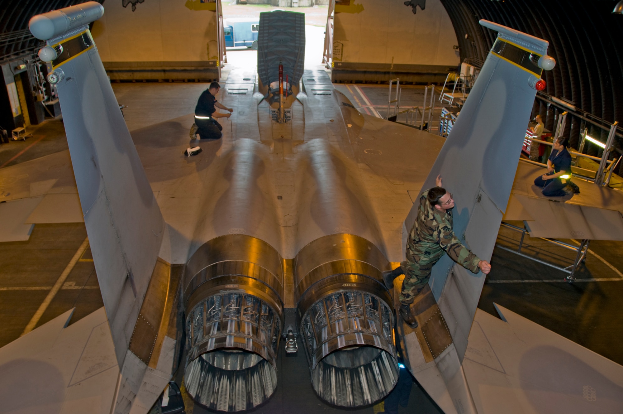 48th Equipment Maintanence Squadron F-15 phase inspection crew chiefs perform phase insection on an F-15 Eagle Aug. 29 at RAF Lakenheah, England (U.S. Air Force photo by Airman 1st Class Perry Aston)