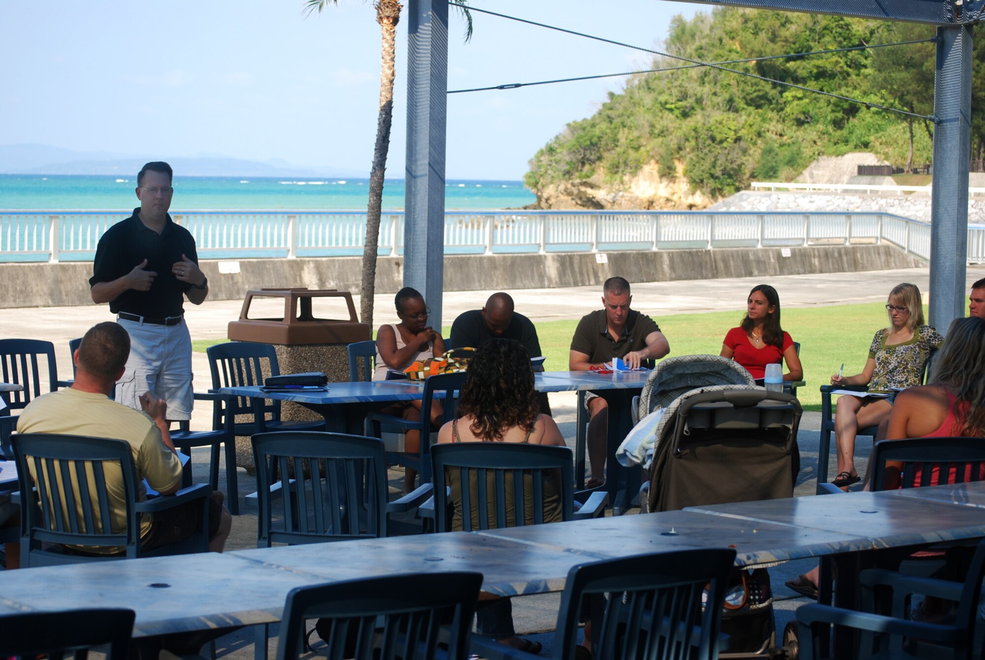 Chaplain (Capt.) Eric Whitmore, 18th Wing chaplain, speaks to couples attending this year’s marriage retreat at Okuma resort. The three-day retreat, sponsored by the 18th Wing Chaplain’s office, gives couples the opportunity to participate in marriage seminars and spend some quality time together. (Photo courtesy of Senior Airman David Hootman) 