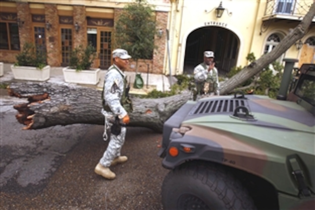 U.S. Army soldiers patrol the streets of New Orleans in support of Hurricane Gustav relief efforts on Sept. 1, 2008. The troops deployed to help residents evacuate the area, to provide security before, during and after the hurricane's landfall and to conduct search and rescue missions in the area. The soldiers are assigned to the 256th Infantry Brigade Combat Team, Louisiana Army National Guard. 