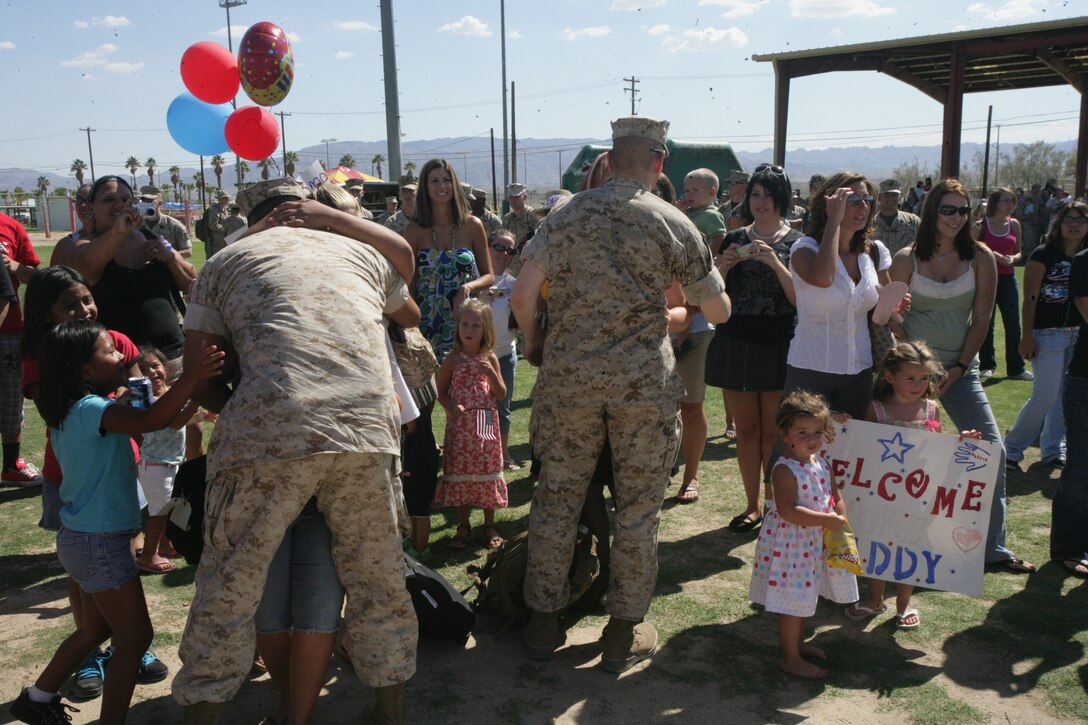 Marines and sailors with Combat Logistics Battalion 7 and 3rd Battalion, 4th Marine Regiment, greet their friends and loved ones for the first time Sept. 5 since departing in February on a deployment in support of Operation Iraqi Freedom.  3/4’s return marks the drawing to a close of their fifth combat deployment in support of Operation Iraqi Freedom. CLB-7 detachments deployed for the third time in February in support of OIF.