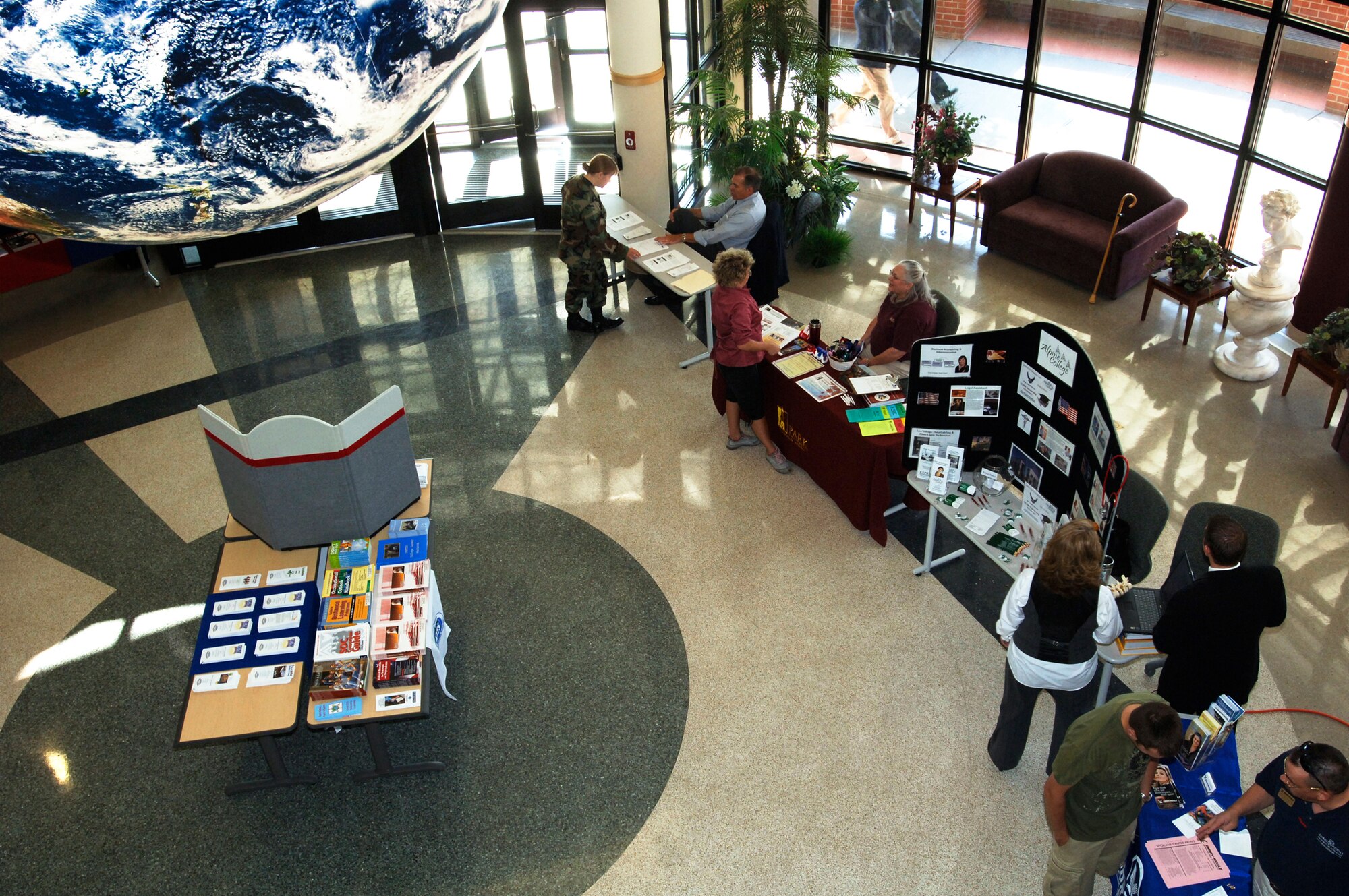 FAIRCHILD AIR FORCE BASE, Wash. – Free merchandise and flyers from different universities are given to Airmen interested in starting school this semester during the Fall Education Fair here Sept. 3. Representatives were available to answer questions and give advice on how to take the first step toward receiving a college degree. (U.S. Air Force photo / Airman 1st Class Melissa Barnett)
