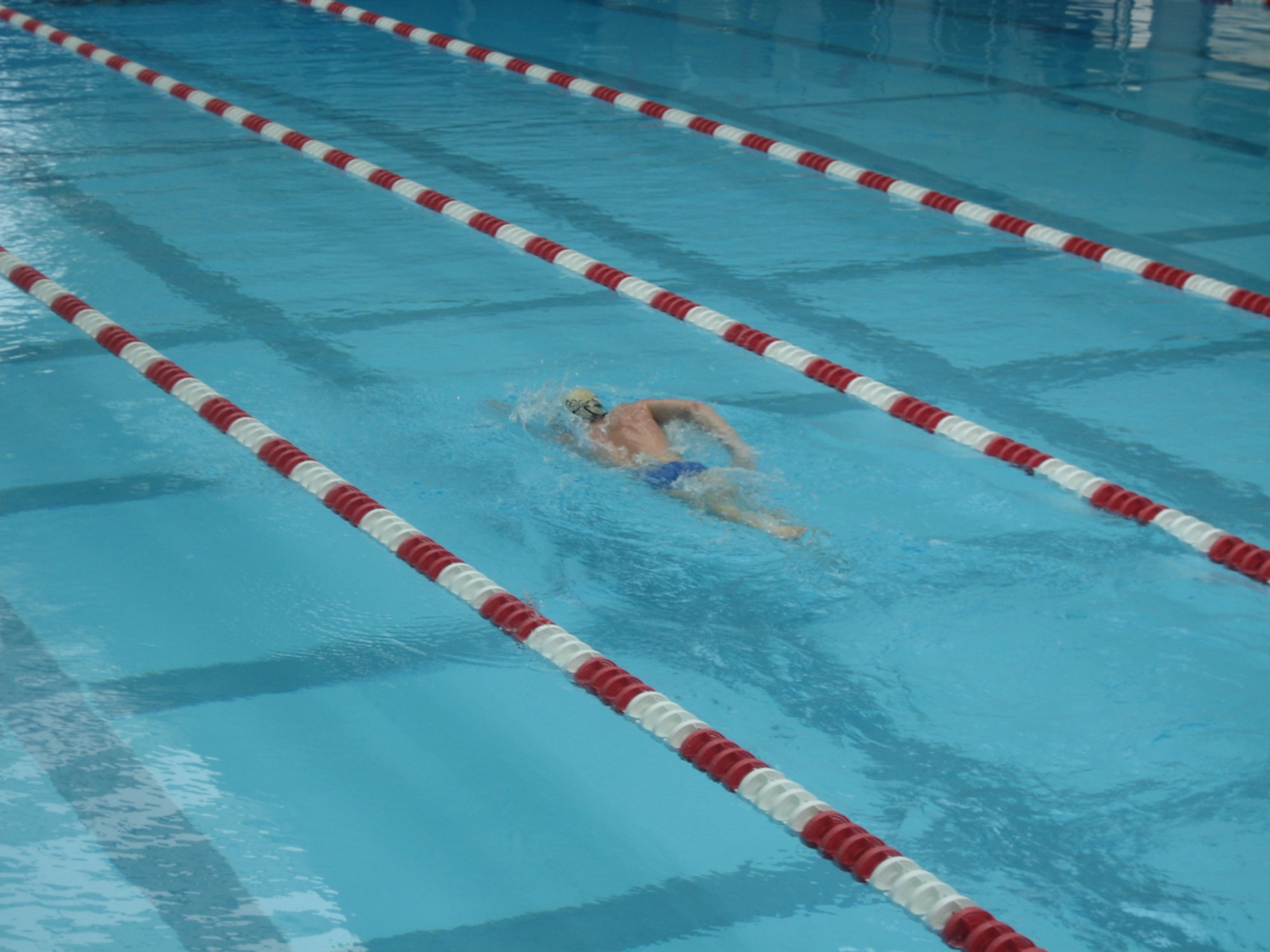 HANSCOM AFB, Mass. -- Olympic triathlete Jarrod Shoemaker swims in the Hanscom pool in preparation for competition. Mr. Shoemaker is a member of the Minuteman Masters Swim Club, which is coached by Hanscom civilian employee Rich Axtell. (U.S. Air Force photo)