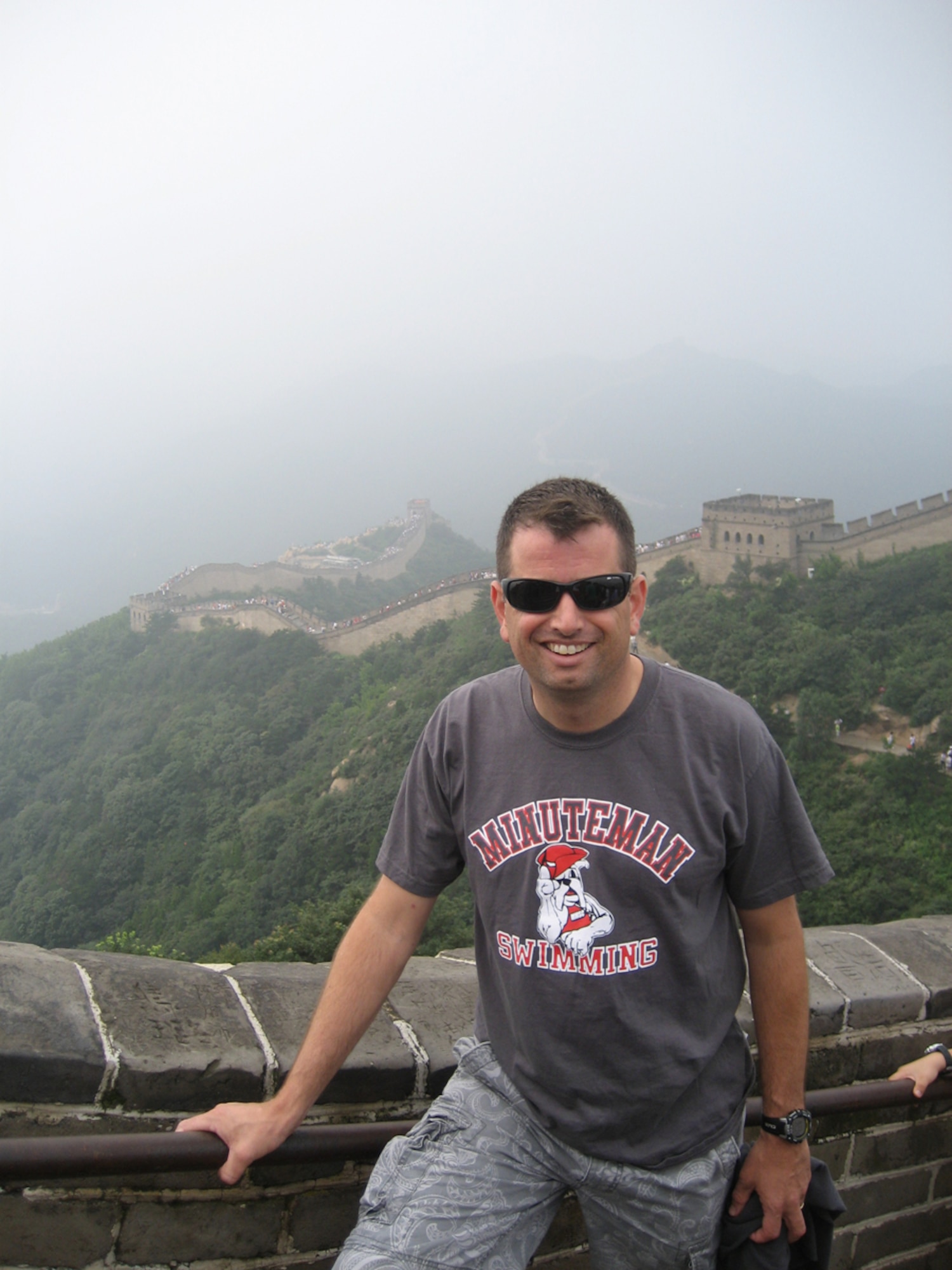 BEIJING -- Rich Axtell, a trainee in the Electronic Systems Center's developmental program, poses in front of the Great Wall of China while visiting the country during the 2008 Olympics. Mr. Axtell is the swim coach for triathlete Jarrod Shoemaker who competed in the games. Mr. Axtell is also the coach for the Minuteman Masters Swim Club, which is operated out of the Hanscom pool. (U.S. Air Force photo)