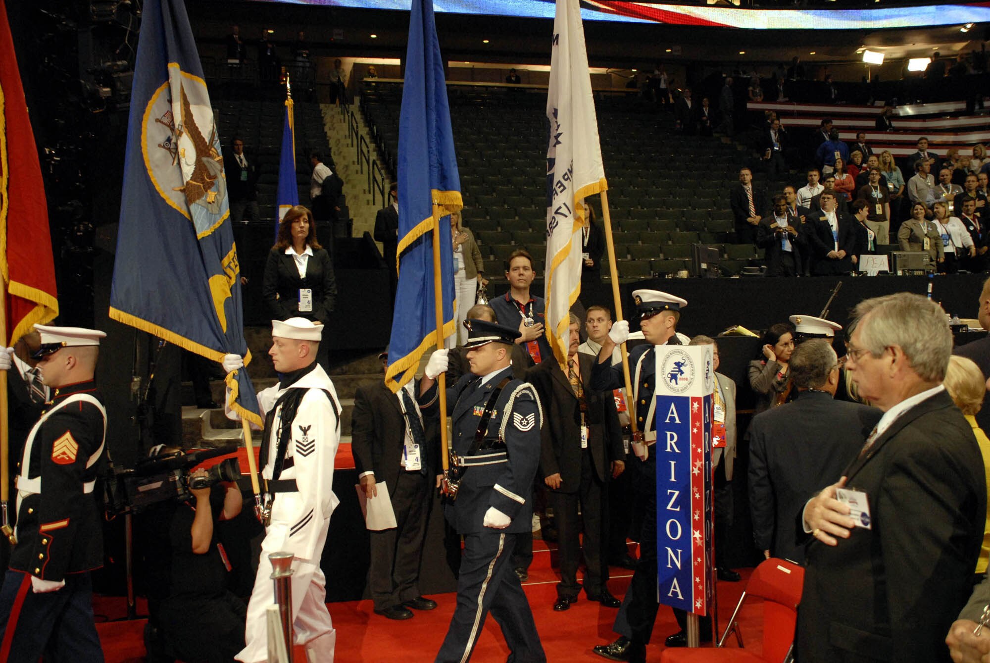Tech. Sgt. Paul Ives(center) 934th Airlift Wing chaplain assistant, carries the Air Force Flag as part of the Joint Service Color Guard at the Republican National Convention Sept. 4. The Color Guard consists of Reservists from the Army, Navy, Air Force, Marines and Coast Guard. (Air Force Photo/Master Sgt. Paul Zadach)