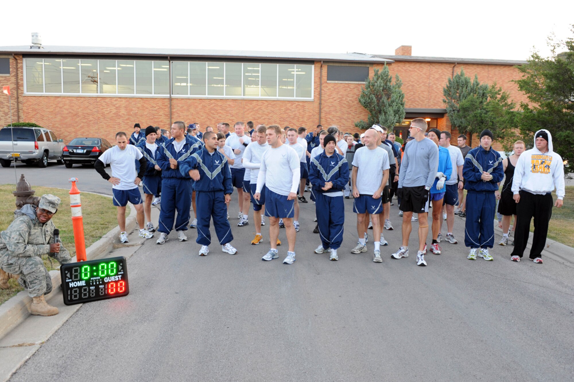 Airmen await the start of the Labor Day 5K run here, Sept. 5. The run organized by the Bellamy Fitness Center staff, provided an opportunity for Airmen on base to participate in fitness as a community. (U.S. Air Force photo/Airman 1st Class Adam Grant)
