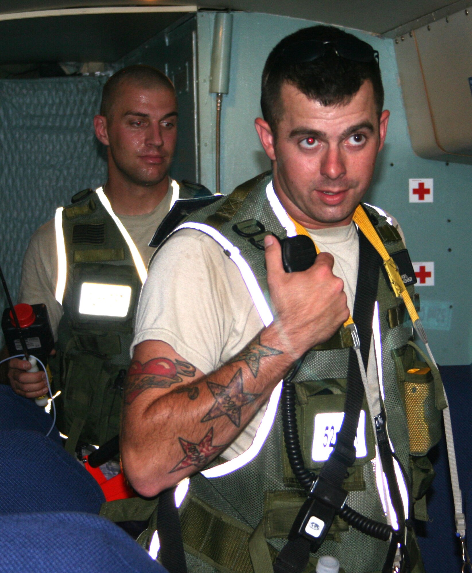 WRIGHT-PATTERSON AFB, Ohio - Ohio Army National Guard Staff Sgt. Nick Landis, 52nd Weapons of Mass Destruction Civil Support Team, reports that the C-5 Galaxy he and Ohio Air National Guard Staff Sgt. Gabe Taylor inspected has no evidence of radiological isotopes during an exercise Sept. 4, 2008 at the 445th Airlift Wing’s flightline at Wright-Patterson Air Force Base, Ohio.  The exercise tested the partnership between and responsiveness of the 52nd WMD Civil Support Team, the Indiana National Guard’s 53rd WMD Civil Support Team, Ohio Task Force 1, the Dayton Fire Department, the Kettering Fire Department and the FBI.  (U.S. Air Force photo by Captain Caroline Wellman)

