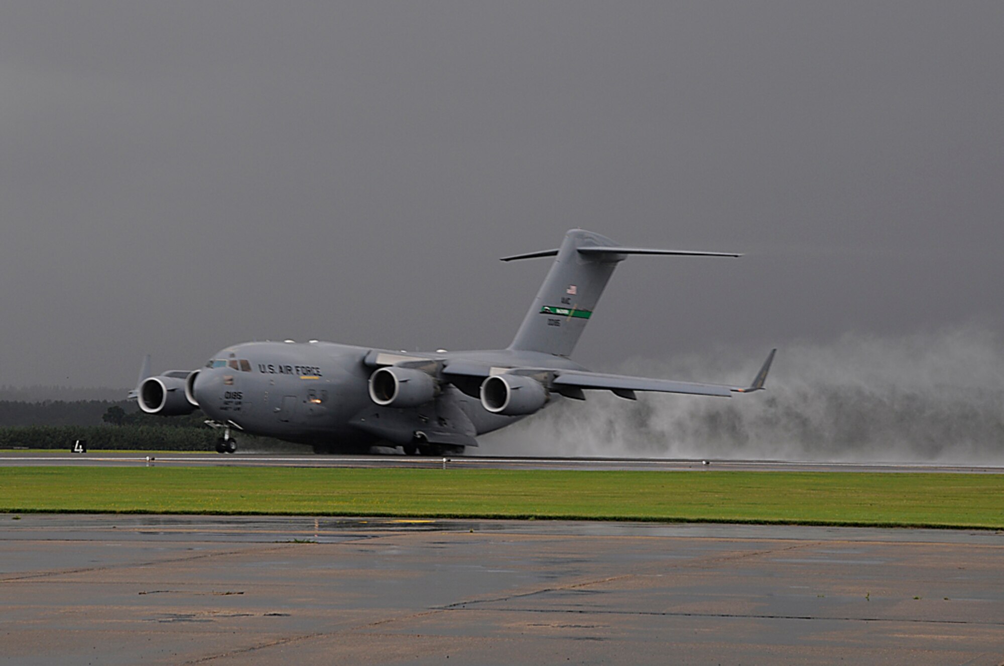 A C-17 takes off from RAF Lakenheath, England on its way back to McChord AFB, Wash. after stopping overnight for rest and fuel. Airmen returning from AEF deployments rely on C-17's as well as commercial airlines to bring them back to their homes and families. (U.S. Air Force photo by Senior Airman Brian J. Ellis)