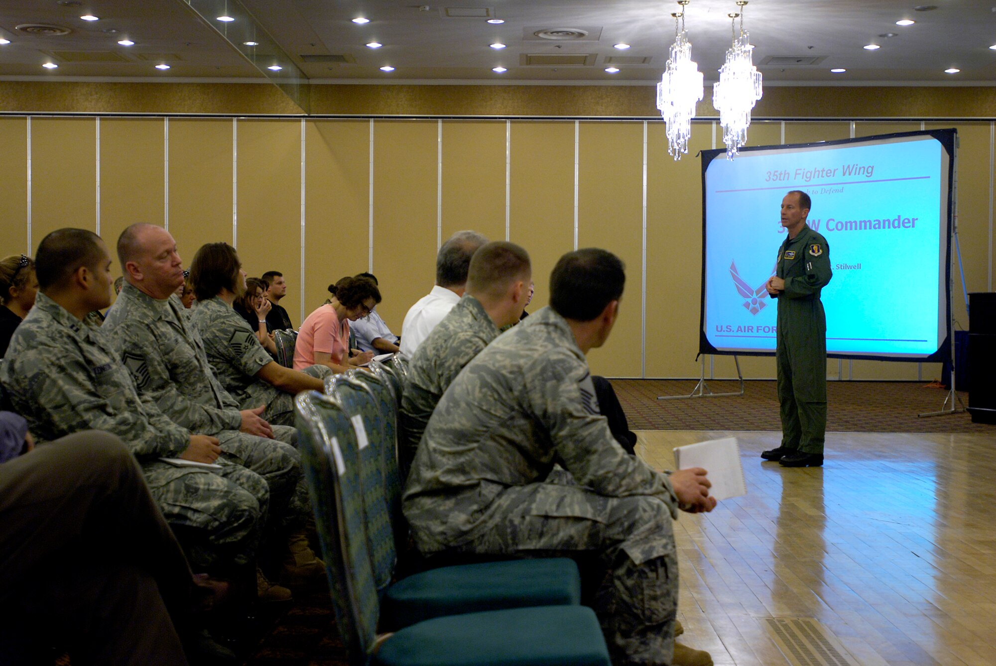 MISAWA AIR BASE, Japan -- Col. David Stilwell, 35th Fighter Wing commander, briefs Airmen and family members about responsibilities when a member is deployed during the base town hall meeting Sept. 2, 2008.  Town hall meetings are important because it gives Misawa personnel a chance to communicate directly with the wing leadership.  (U.S. Air Force photo by Senior Airman Chad Strohmeyer)