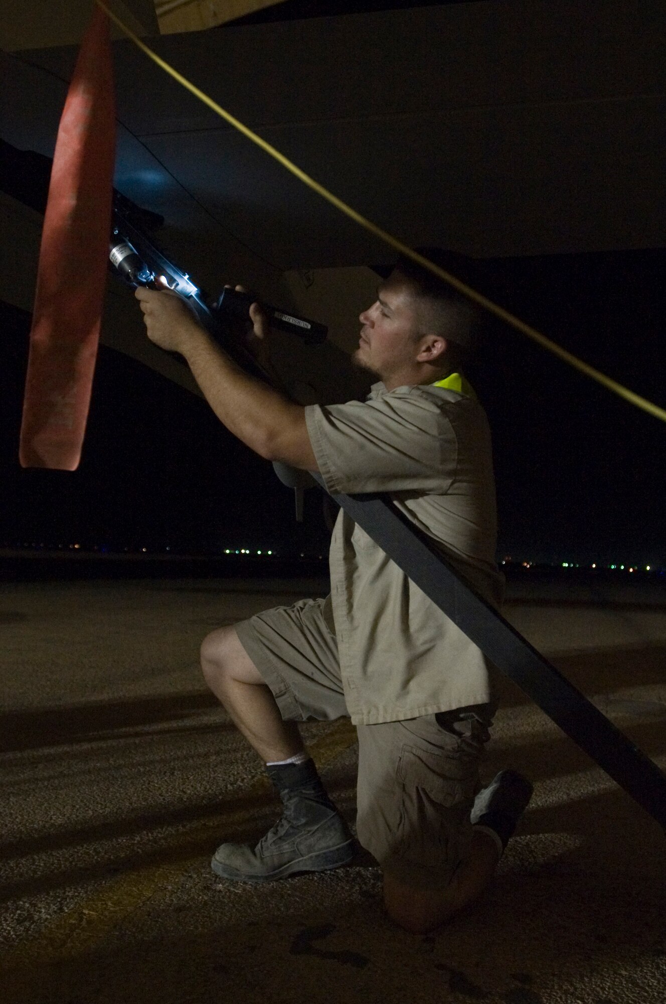 ALI BASE, Iraq -- Adam Wilson, Detachment 1 46th Expeditionary Reconnaissance Attack Squadron, performs post maintenance on a MQ-1B Predator Sept. 3, 2008. The Predator is a medium-altitude, long-endurance, remotely piloted aircraft. Its mission here is to interdict and conduct armed reconnaissance against critical and perishable targets in support of the Global War on Terrorism. (U.S. Air Force photo/Airman 1st Class Christopher Griffin)