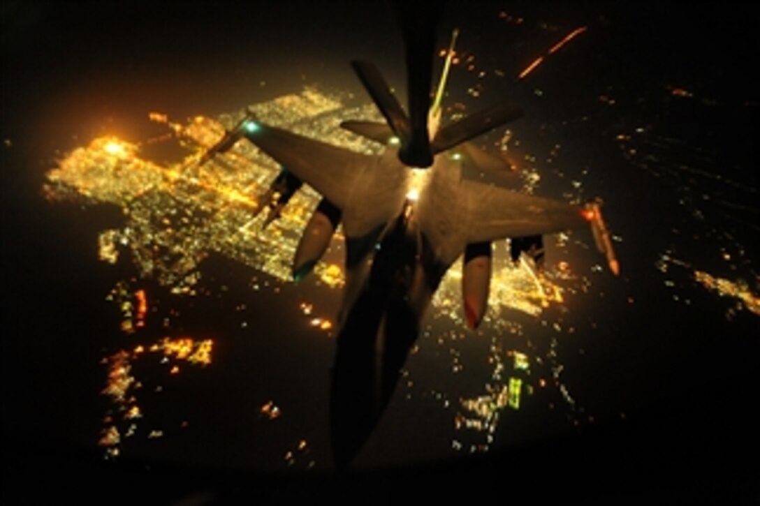 An F-16 Fighting Falcon aircraft from Joint Base Balad, Iraq, refuels from a KC-135 Stratotanker aircraft from the 763rd Expeditionary Refueling Squadron during a mission over Iraq on Sept. 3, 2008.  