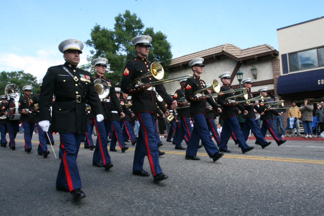 The Combat Center Band march in formation down Elkhorn Ave. Sept. 6 in Estes Park, Colo., during the town’s annual Long’s Peak Scottish-Irish Highland Festival Parade.  Fans braved chilly nights, with the help of hot chocolate and hot dogs, to see the bands’ quick and crisp marches and hear their defined sound, which makes them a fan favorite where-ever they go.  While some may think the band is merely an act for the ears and eyes, fans in attendance admitted the band also served as a unique means of boosting their morale and patriotism.  The festival, which celebrates Celtic traditions, featured Celtic music concerts, jousting competitions, Scottish athletic events, dancing competitions, vendors, and a dog exhibition competition, among other things.