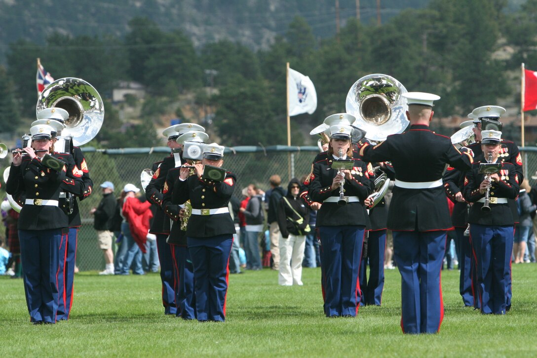 The Combat Center Band performs at the Stanley Park Fairgrounds Sept. 6 in Estes Park, Colo., during the town’s annual Long’s Peak Scottish-Irish Highland Festival Parade.  Fans braved chilly nights, with the help of hot chocolate and hot dogs, to see the bands’ quick and crisp marches and hear their defined sound, which makes them a fan favorite where-ever they go.  While some may think the band is merely an act for the ears and eyes, fans in attendance admitted the band also served as a unique means of boosting their morale and patriotism.  The festival, which celebrates Celtic traditions, featured Celtic music concerts, jousting competitions, Scottish athletic events, dancing competitions, vendors, and a dog exhibition competition, among other things.