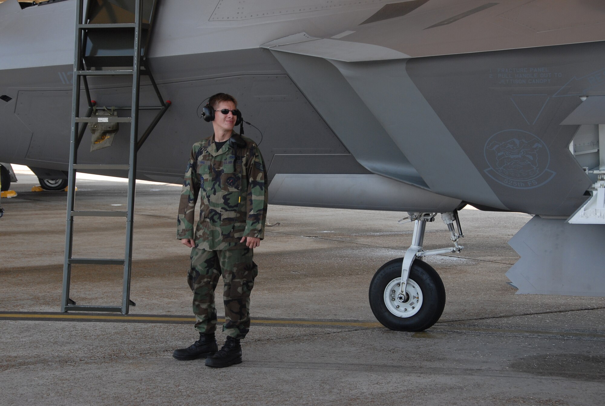 Staff Sgt.Temujin Ching, 477th Aircraft Maintenance Squadron crew chief, prepares for a sortie during Weapons Systems Evaluation Program at Tyndall Air Force Base, Florida. Reserve pilots from the 302nd Fighter Squadron and maintainers from the 477th Maintenance Squadron teamed up with the 3rd Wing, Elmendorf Air Force Base, Alaska to create a Total Force team. U.S. Air Force photo/ Capt. Torri White)
