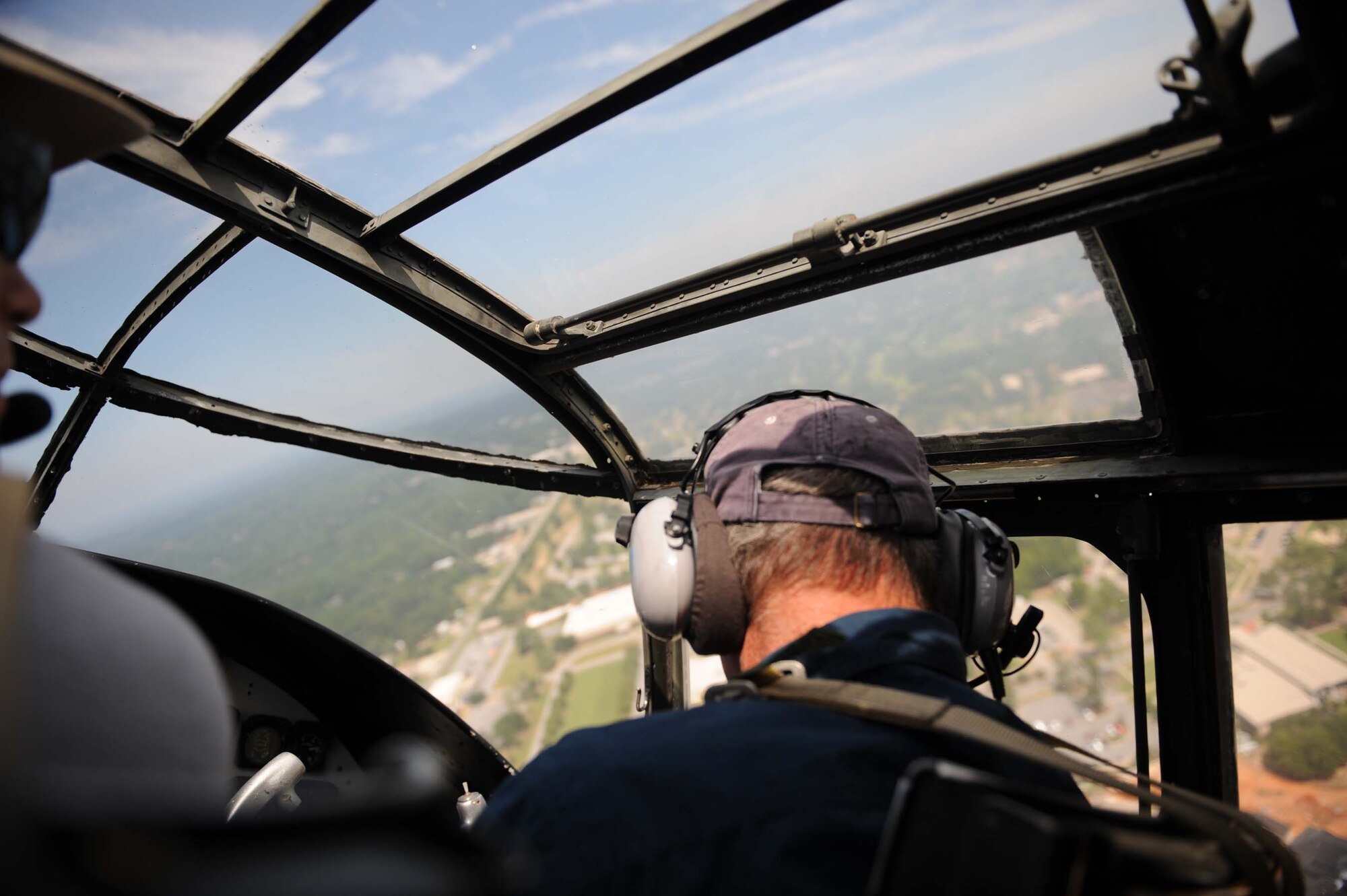 SHAW AIR FORCE BASE, S.C. -- Pilot Tom Reilly looks out over the crowd as he banks his B-25 to make another pass during ShawFest 2008, "Thunder over the Midlands" air show Sept 6. ShawFest is a tribute to Sumter and local communities for their support of the military personnel of Shaw Air Force Base. (U.S. Air Force photo/Staff Sgt. Henry Hoegen)