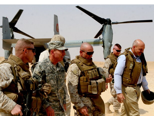 Army Gen. David Petraeus, commanding general of Multi-National Force - Iraq, arrives at Camp Gannon, Iraq, Sept. 6 to visit Iraqi security forces along the Iraqi-Syrian border and speak with the service members at the camp. Petraeus also recognized several service members and presented them with coins.