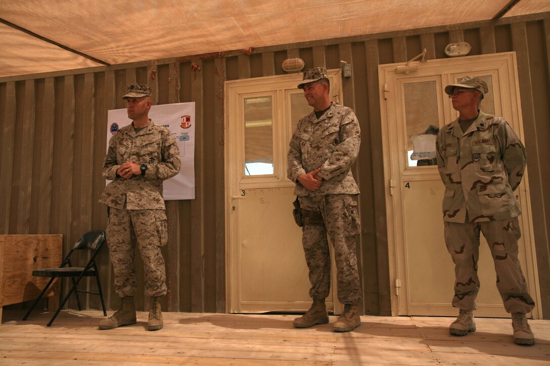 CAMP TAQADDUM, Iraq – Col. Gary D. West, the commander of Defense Logistics Agency, Iraq, thanks the 1st Marine Logistics Group for their support of the Camp Taqaddum Property Disposal Office during the building’s opening, Sept. 6. The TQ PDO provides receipt of equipment for units in the vicinity of Taqaddum, Ramadi, and Fallujah.  The office is a significant development because it will allow service members to properly get rid of their excess or broken equipment and help reduce their footprint in Iraq. (Photo by Cpl. Tyler B. Barstow)