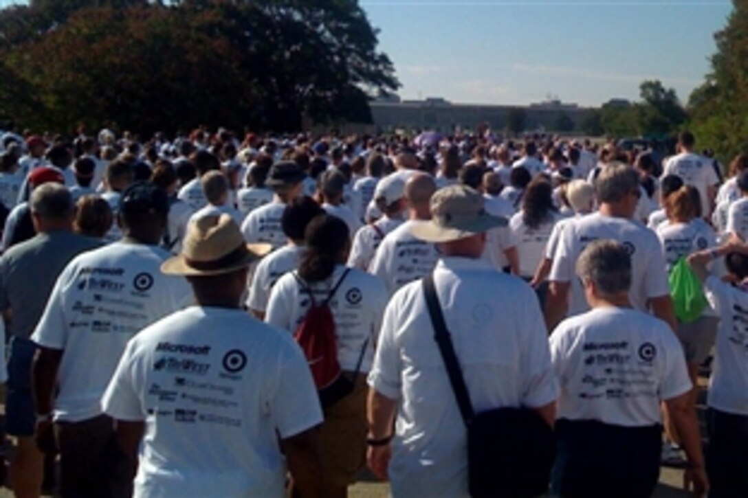 Participants in the 4th annual America Supports You Freedom Walk approach the Pentagon, Sept. 7, 2008. The walk is a national tradition that calls on people to reflect on the lives lost on Sept. 11, 2001, remember those who responded, honor our veterans past and present and renew our commitment to freedom and the values of our country. 