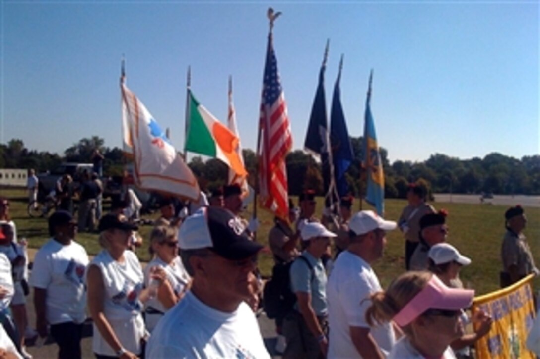 Flag bearers carry Old Glory during the 2008 National America Supports You Freedom Walk in Washington, D.C., Sept. 7, 2008. The walk is a tradition that calls on people to reflect on the lives lost on Sept. 11, 2001, remember those who responded, honor our veterans past and present and renew our commitment to freedom and the values of our country. 