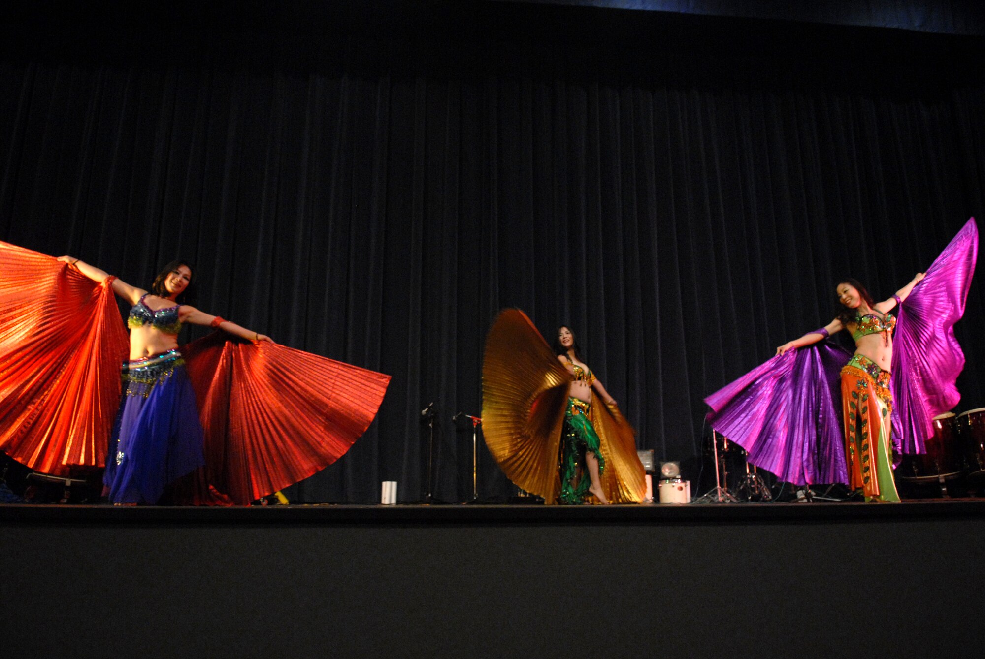 KUNSAN AIR BASE, Republic Of Korea -- Dancers  from the Heuksori Korean drum and dance team perform here Sept. 5. The Korean American Golf Association and the Korean Employee Golf Association sponsored this event free for all servicemembers. (US Air Photo by Senior Airman Angela Ruiz)