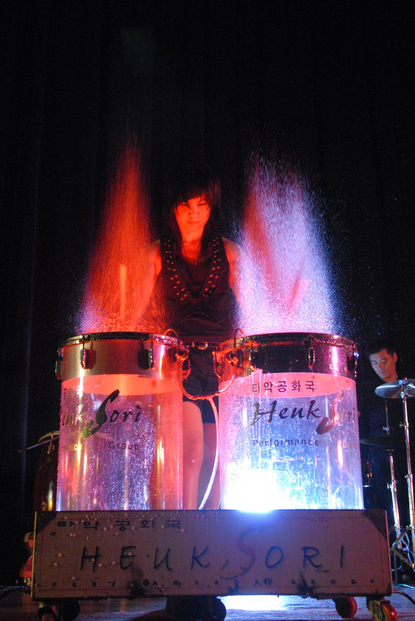 KUNSAN AIR BASE, Republic Of Korea -- A drummer  from the Heuksori Korean drum and dance team performs here Sept. 5. The Korean American Golf Association and the Korean Employee Golf Association sponsored this event free for all servicemembers. (US Air Photo by Senior Airman Angela Ruiz)