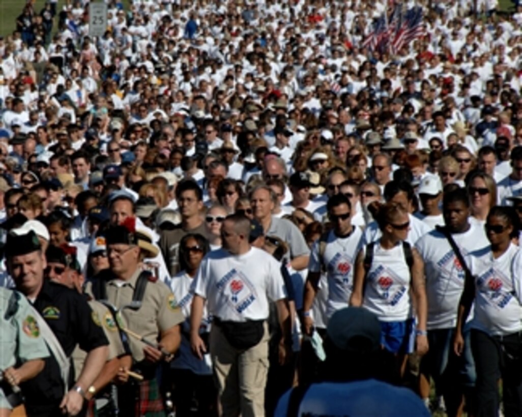 Thousands of people participate in the America Supports You Freedom Walk in Washington, D.C., on Sept. 7, 2008.  The walk starts at the Women in Military Service for America Memorial at Arlington National Cemetery and concludes at the Sep. 11, 2001, crash site at the Pentagon.  