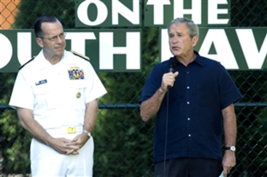 President Bush and U.S. Navy Adm. Mike Mullen, chairman of the Joint Chiefs of Staff, address participants at the 20th Tee Ball on the South Lawn of the White House, Sept. 7, 2008. The game honored families in the armed services and players had parents who are currently serving on active duty in the Army, Navy, Air Force, Marines or Coast Guard.