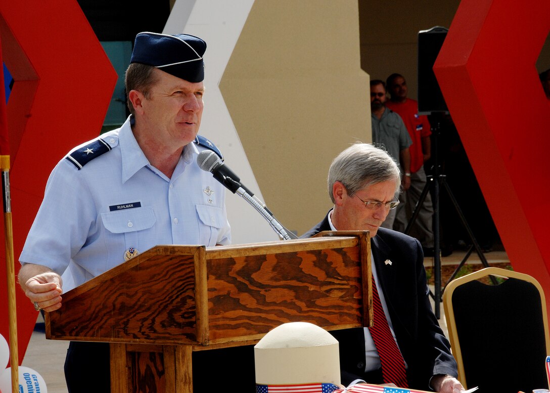 ANDERSEN AIR FORCE BASE, Guam - Brigadier Gen. Philip Ruhlman, 36th Wing commander, speaks during the grand opening ceremony of the Base Exchange here Sept. 10. The new BX, located across the street from the Car Care Gas Station, provides a wide variety of services to meet Team Andersen Airmen's needs, including six restaurants, a computer repair shop, a hair salon and many more concession shops. The new BX also offers merchandise from local vendors. (U.S Air Force photo by Airman 1st Class Nichelle Griffiths)

