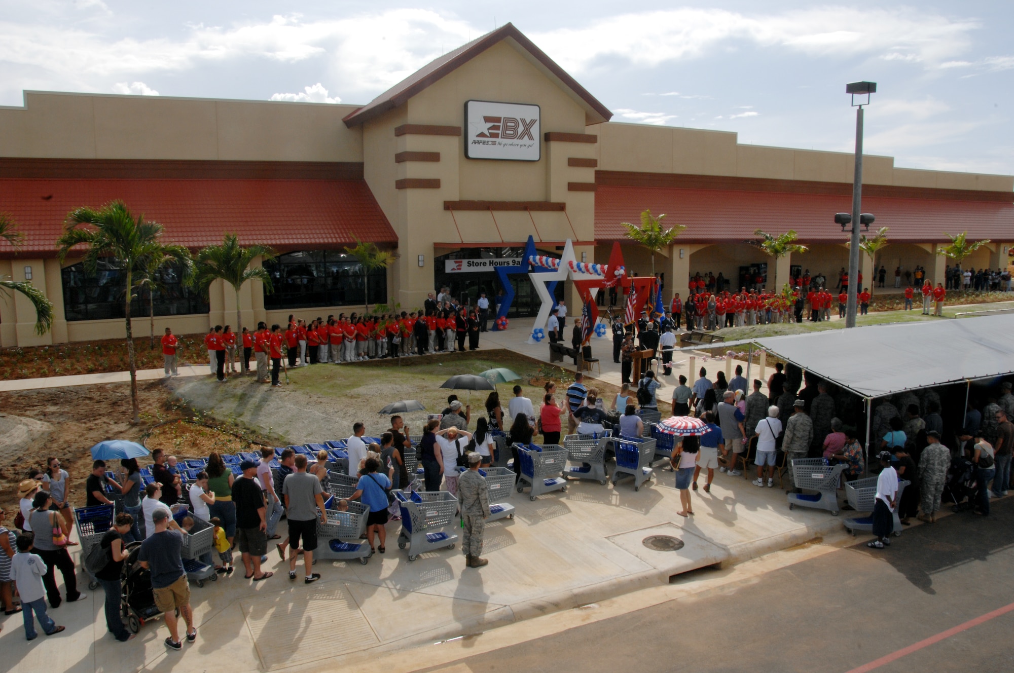 ANDERSEN AIR FORCE BASE, Guam- Members of Team Andersen line up outside awaiting the grand opening of the Base Exchange here Sept. 10. The new shopping complex is more than 181,000 square feet. (U.S Air Force photo by Airman 1st Class Nichelle Griffiths)

