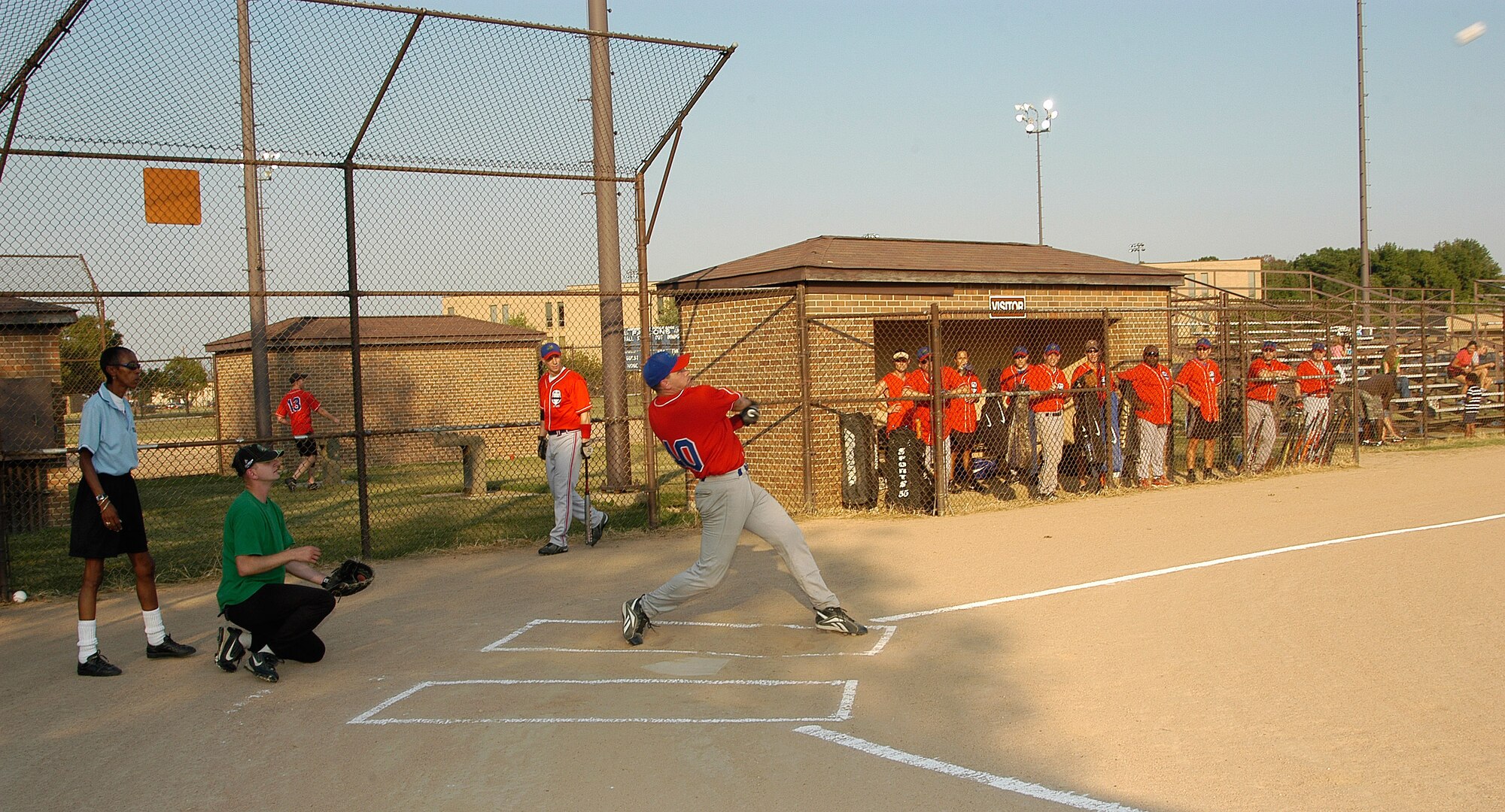 Jeff Dahlke, AFOSI Gators, sends a pitch over the center field fences in the top of the first inning for a quick 2-0 lead over 744th COMM in the first of two games for the Andrews Air Force Base Intramural Softball Championship. (U.S. Air Force photo/Tech. Sgt John Jung) 