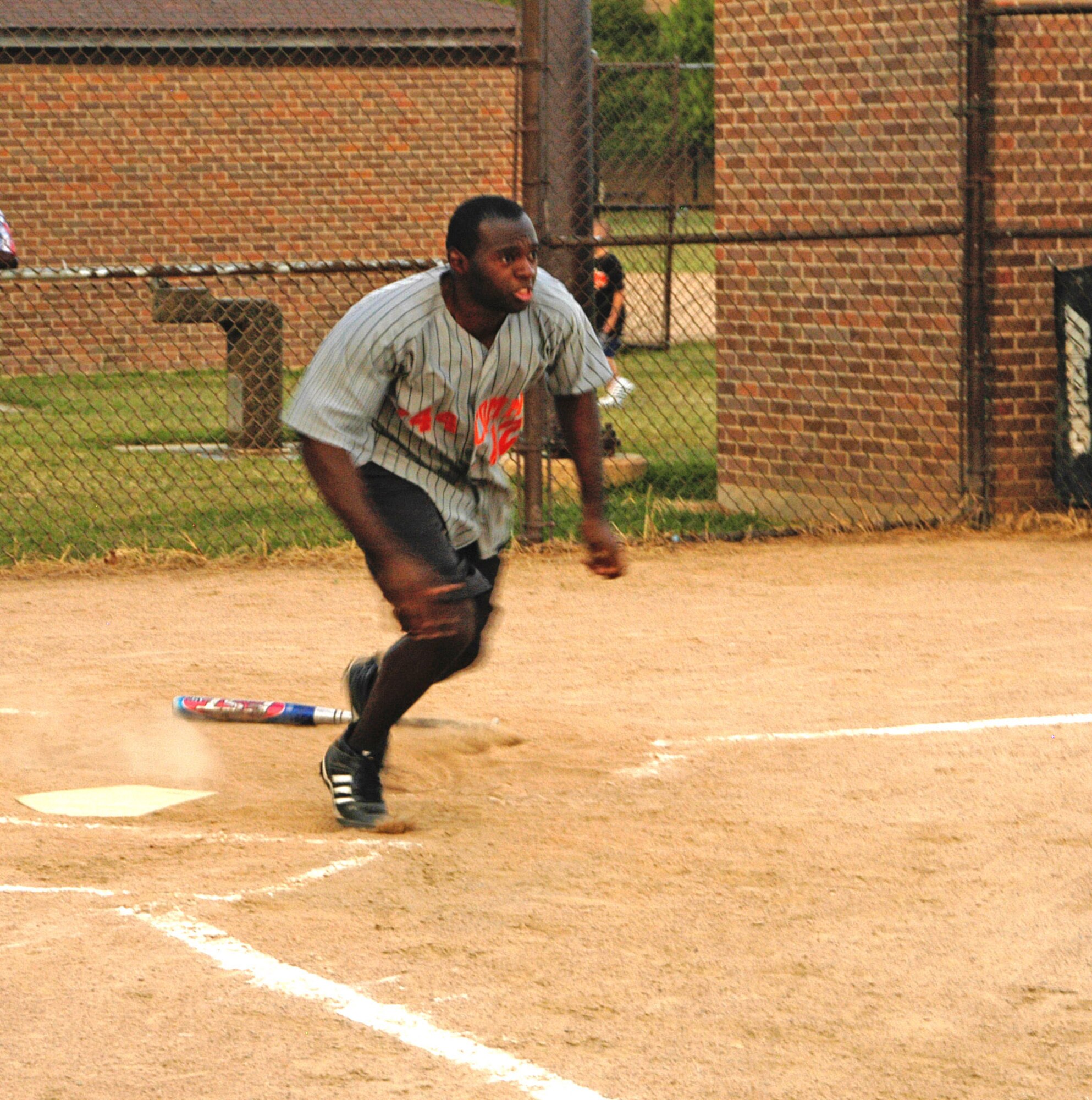 Glenn Andrews, 744th COMM, watches his single go into right field in the first game of two versus the AFOSI Gators. The Gators won both games, 16-2 and 4-2 respectivley, to win the Andrews Air Force Base Intramural Softball Championship. (U.S. Air Force photo/Tech. Sgt John Jung)
