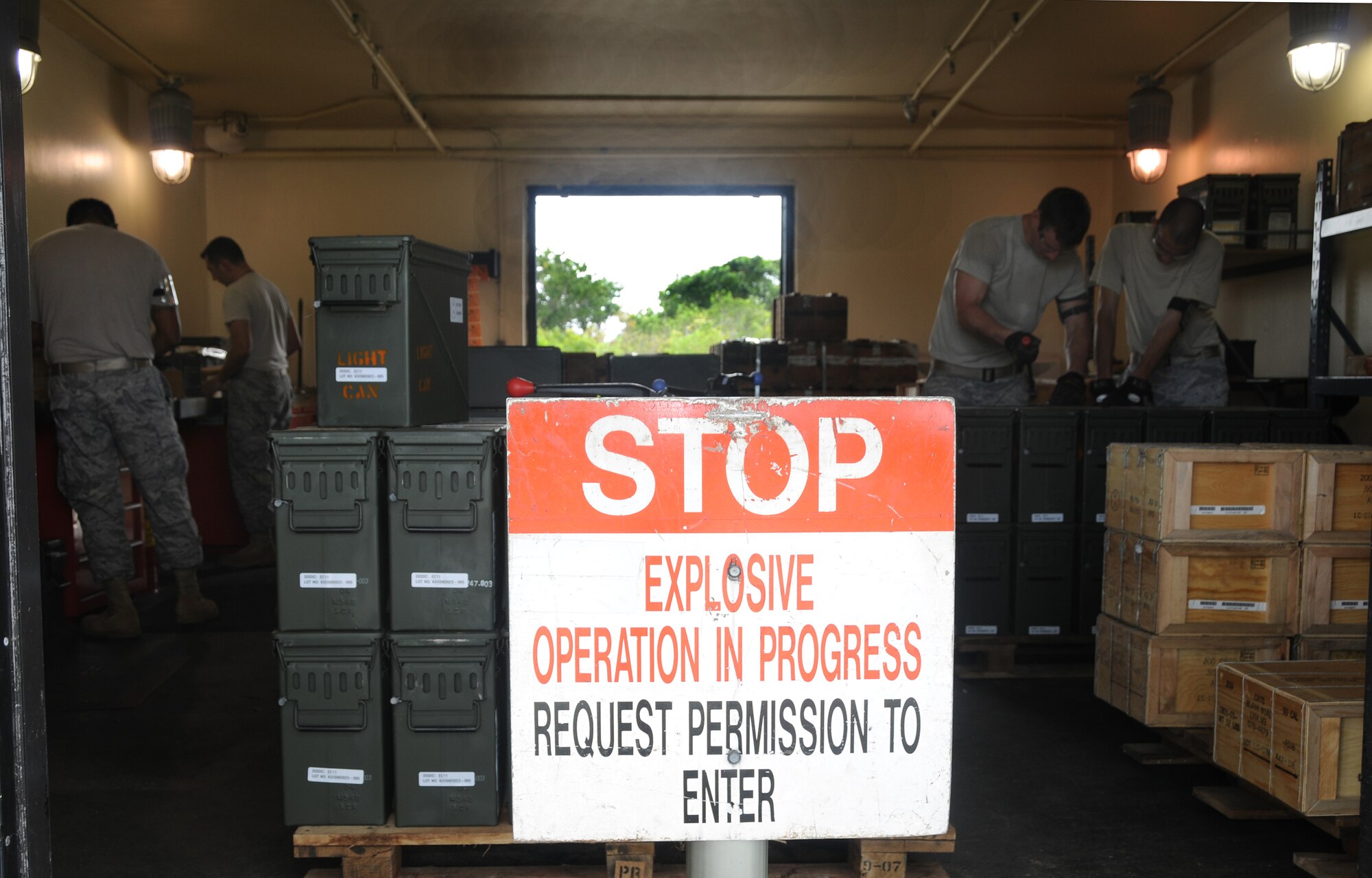 ANDERSEN AIR FORCE BASE, Guam - Airmen from the 36th Munitions Squadron perform inspections on a new shipment of bomb fuses here Sept. 8. The weapons flight is charged with maintaining the largest CALCM stockpile in the Air Force. They perform periodic inspections and testing, field level modifications and repair as necessary. The flight also maintains all bomber and fighter weapons release equipment and alternate mission equipment for all aircraft deploying to Andersen. (U.S. Air Force photo by Airman 1st Class Courtney Witt)