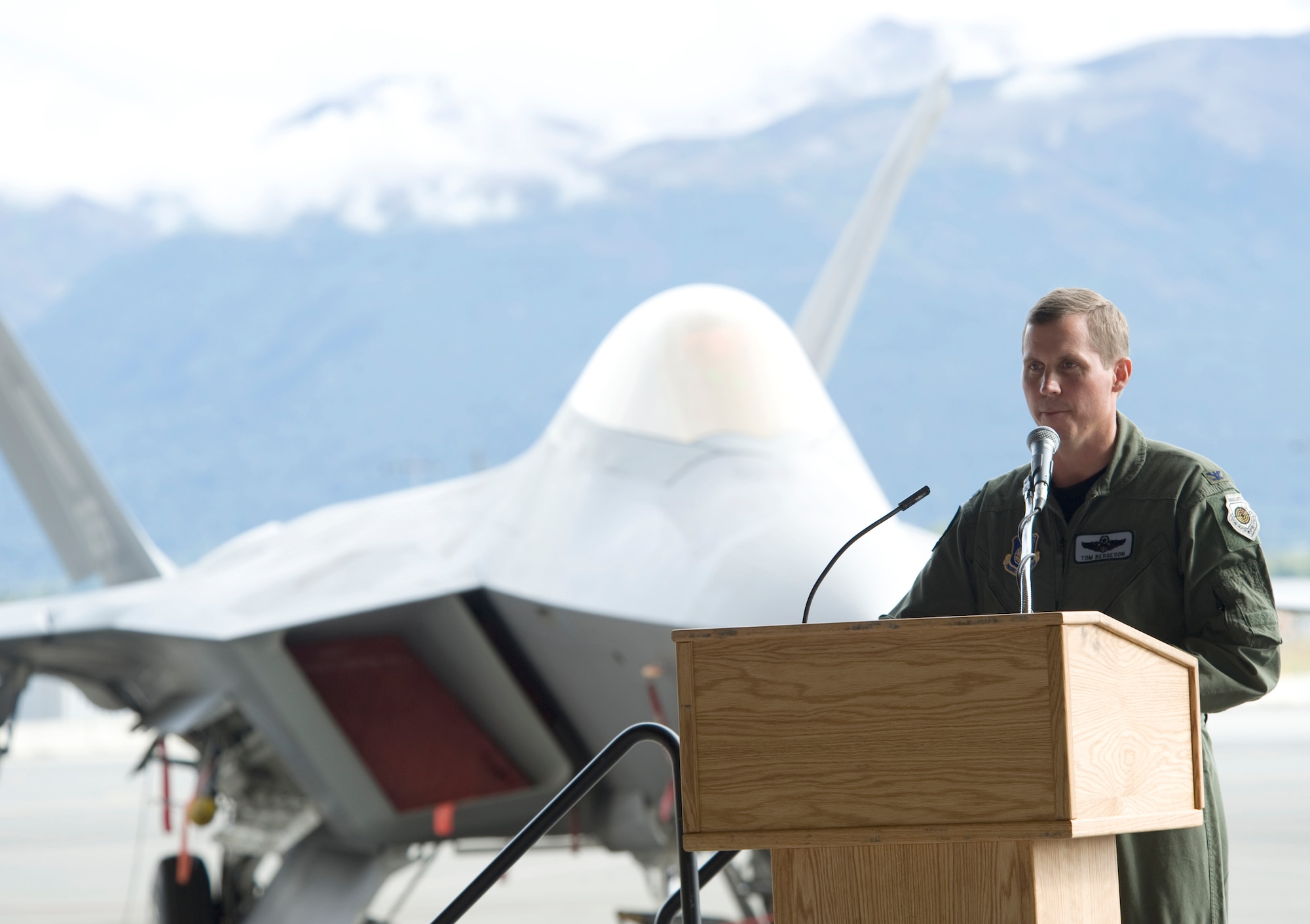 ELMENDORF AIR FORCE BASE, Alaska -- Col. Thomas Bergeson, 3rd Wing commander, speaks to the attendants of the Initial Operational Capability ceremony Sept. 5. The ceremony was held to celebrate the combat capability of the C-17 Globemaster III and the F-22A Raptor. (U.S. Air Force photo/Senior Airman Matthew Owens)